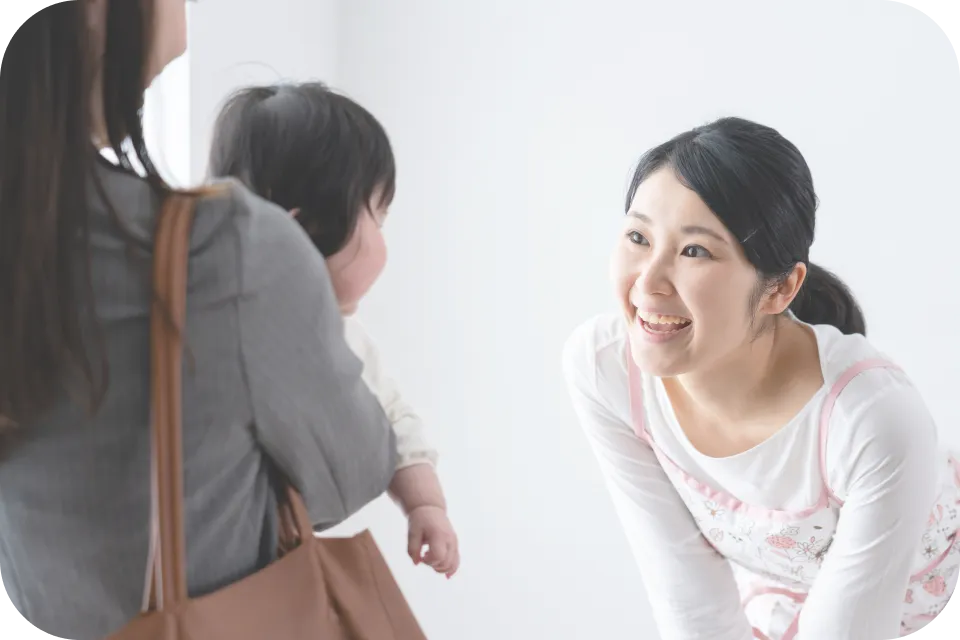 赤ちゃんと話す先生